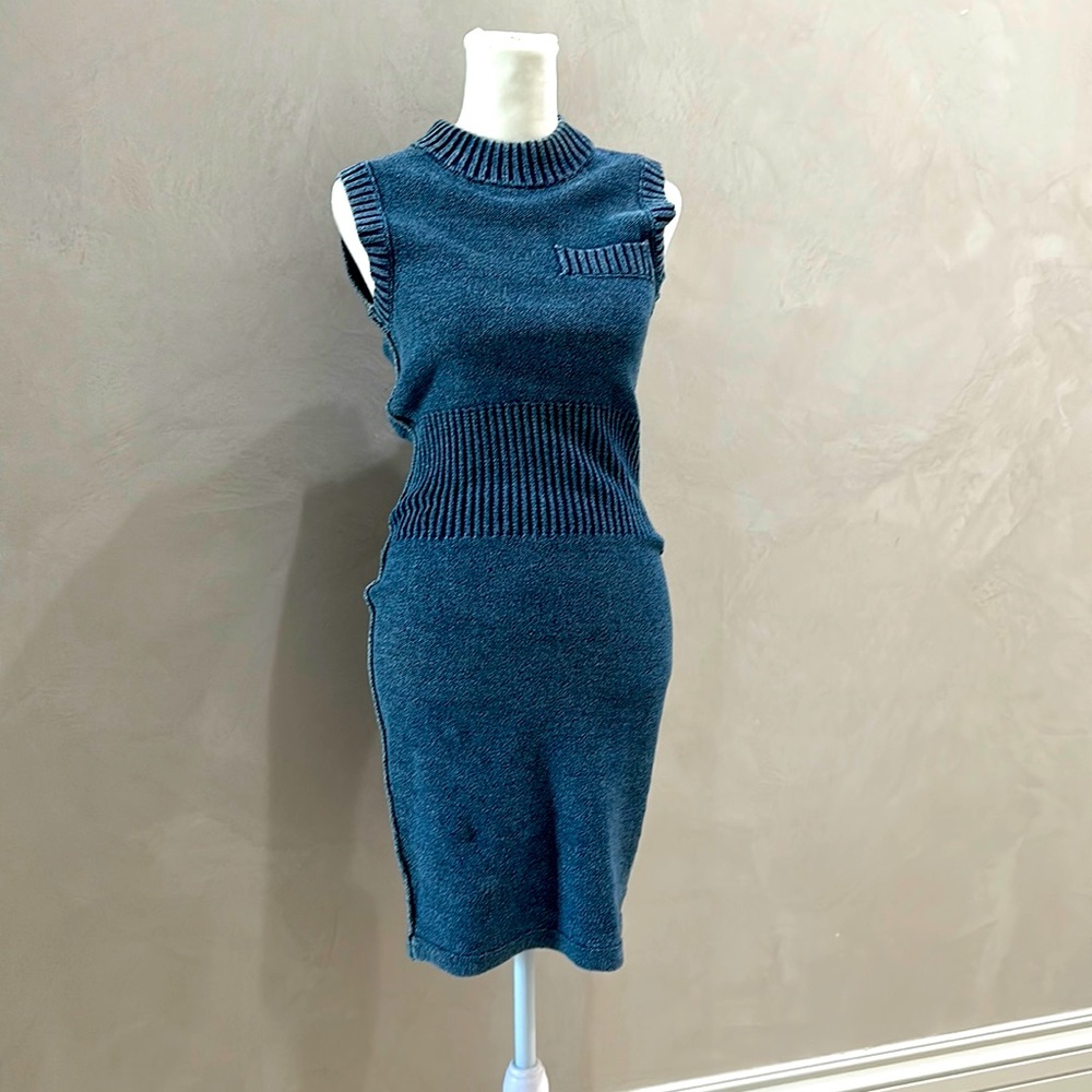 Form fitting soft dress. Comes to mid thigh. Perfect for any season